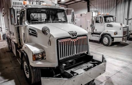 Rail-11 hydrovac trucks parked